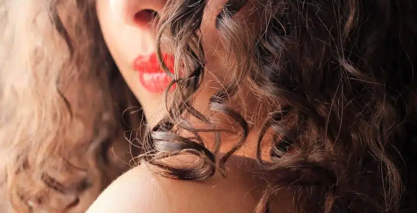 woman with red lipstick and blonde hair