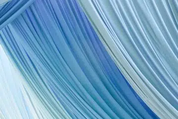 blue and white striped textile